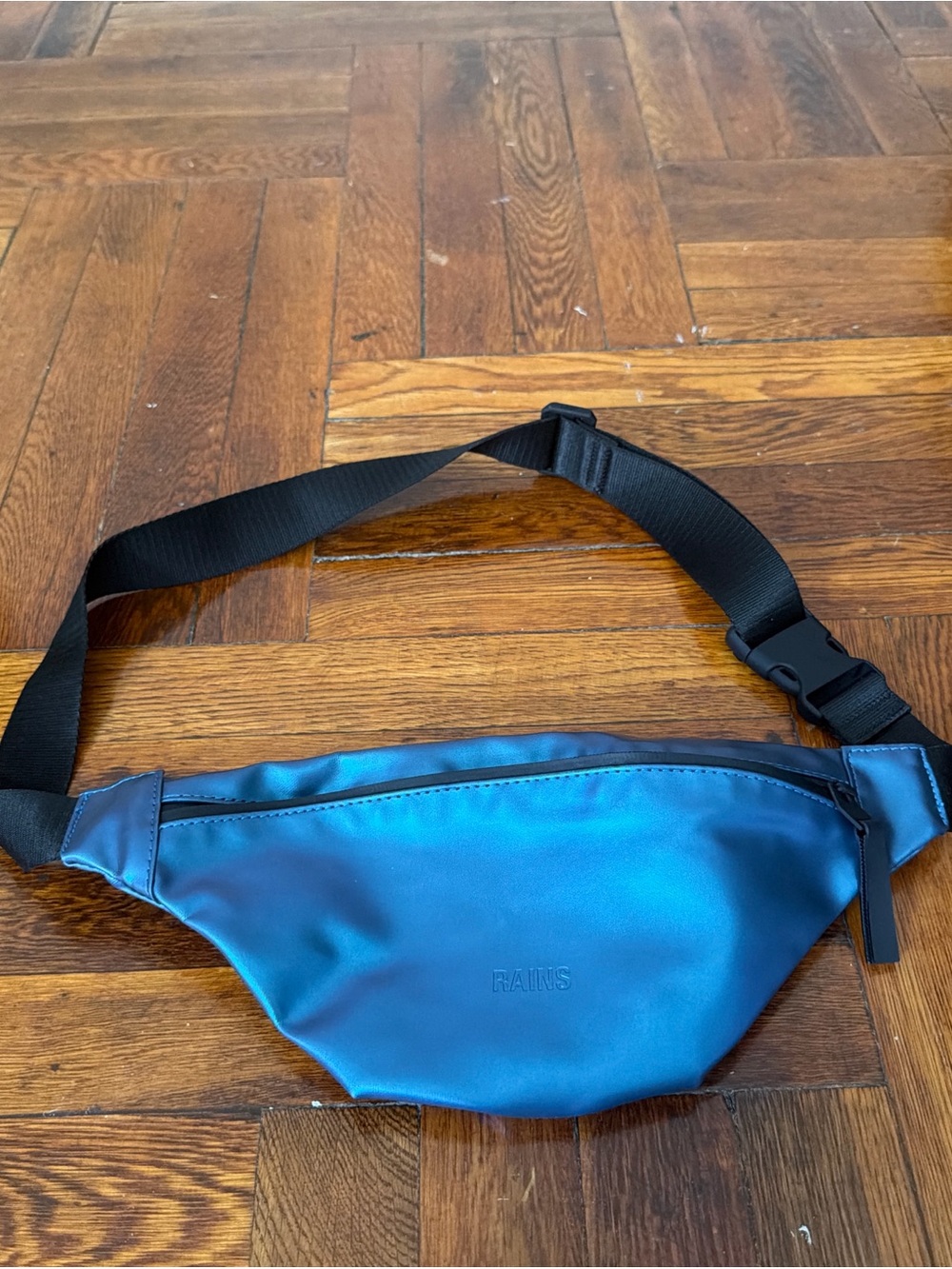Rains Teal Blue Crossbody Belt Bag with Black Strap